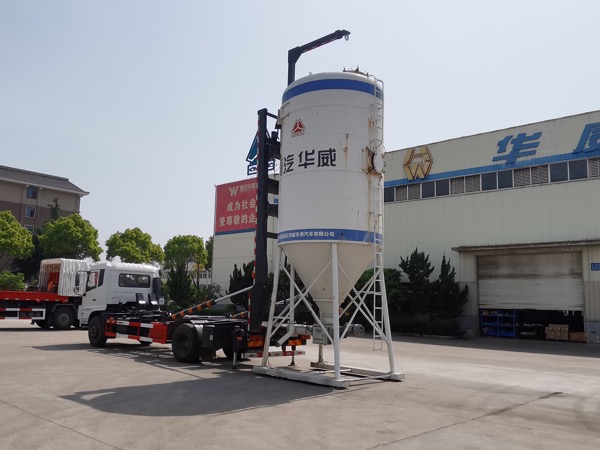 華威馳樂(lè )牌SGZ5180ZBGDF6型干粉砂漿移動(dòng)筒倉-背罐車(chē)介紹：  【選裝液壓伸縮吊臂】
